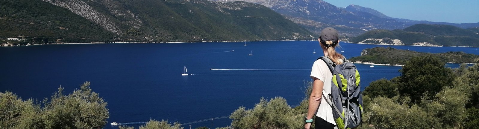 Catamaran anchored in clear water near the Greek Islands